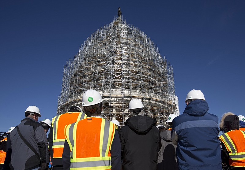 Capitol Dome enshrouded with scaffolding is an iconic snapshot of our time.