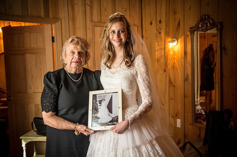 Elsa Connally, right, and her grandmother, Patricia Noles, shared a wedding dress last worn in 1953. 
