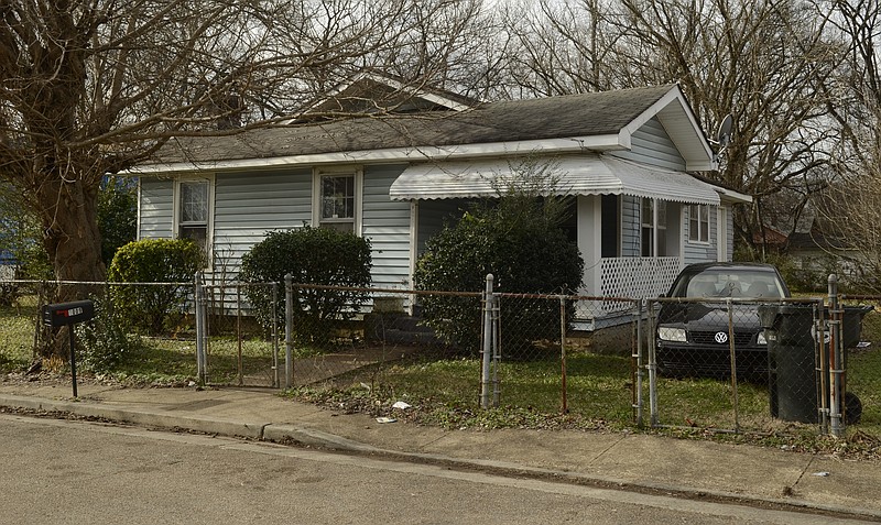 This house at 1009 N. Hawthorne St. was the scene of a shooting Tuesday night that wounded a 16-year-old girl and an 18-year-old man. Nearby houses and cars were also damaged in what witnesses described as a hail of bullets.