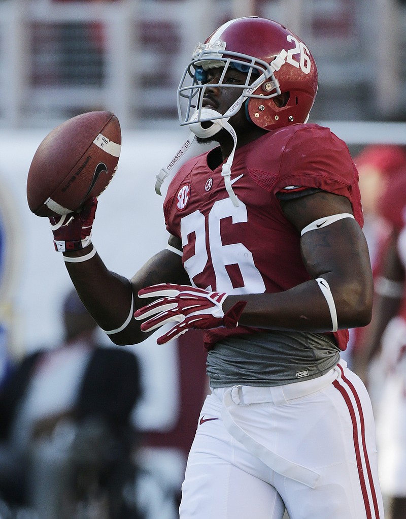 Alabama running back Alvin Kamara (26) catches a ball prior to his game against Mississippi in this 2013 photo.