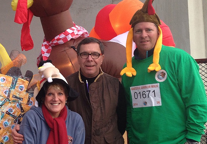 Grateful Gobbler race directors Betsy and Stan McCright, left, with Chris Maclellan.