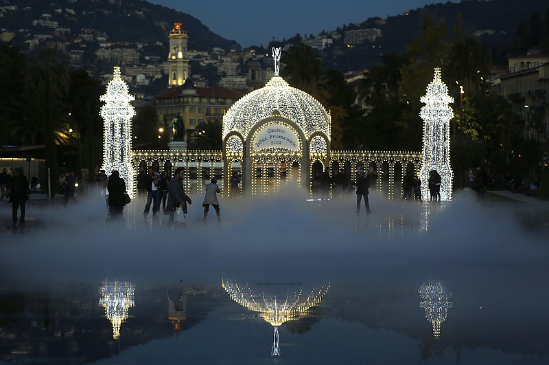 A replica of the casino is seen along the Promenade jetty, as part of the Christmas holiday illuminations in Nice, Thursday, Dec. 18, 2014. Several Christmas decorations are displayed downtown of Nice city.