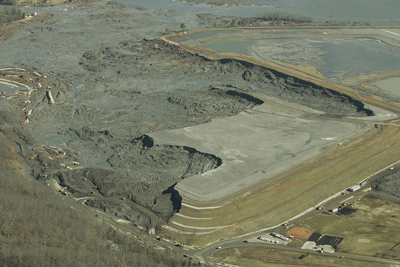 A coal ash slurry left behind in a containment pond near the Tennessee Valley Authority's Kingston Fossil Plant is shown  in Harriman, Tenn., after the dyke at left broke Dec. 22, 2008.