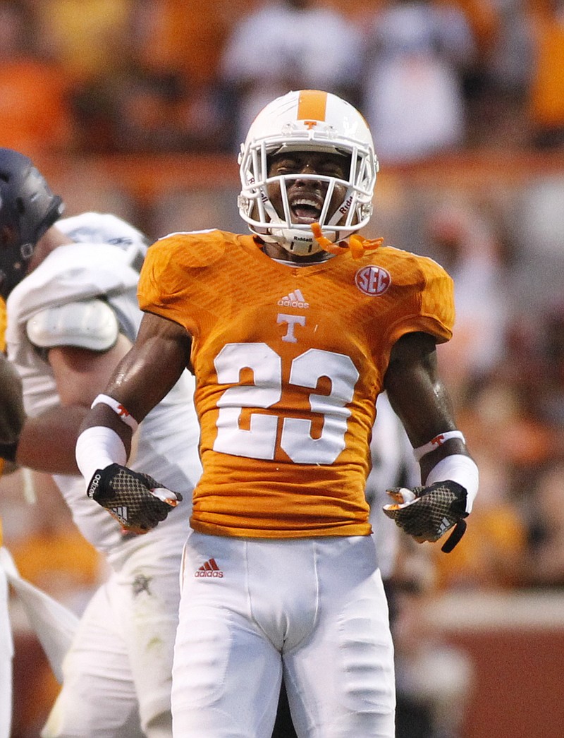 Tennessee defensive back Cameron Sutton celebrates stopping Utah State on 3rd down during the Vols' season-opener football game against the Aggies on Sunday, Aug. 31, 2014, at Neyland Stadium in Knoxville, Tenn.