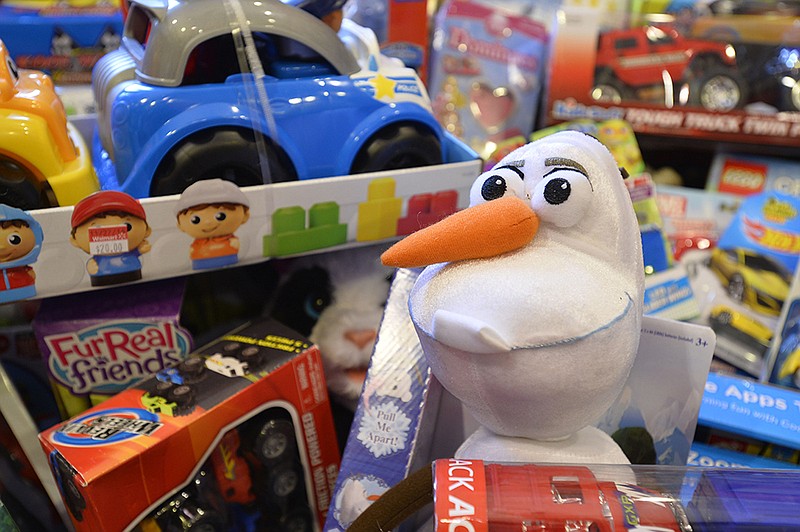 The popular character Olaf from the movie "Frozen" was one of 275 toys donated during a toy drive organized by real estate agent Frank Duffy. The toys were donated by clients and employees before Duffy matched the contributions one-for-one and then added 69 more to the tally before he donated them all to the Toys for Tots charity on Friday, Dec. 19, 2014, in Alpharetta, Ga.