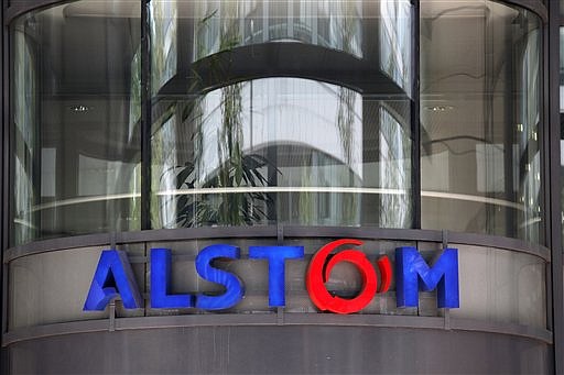 This April 30, 2014, file photo shows the company logo of Alstom at the headquarters in Levallois-Perret, outside Paris, France.