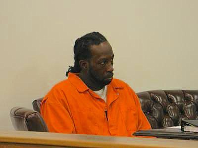 Maurice Johnson, convicted in the 1999 Valentine's Day triple slaying in Cleveland, Tenn., attends a post-conviction relief hearing on Friday. Special Judge Don Ash is expected to make a ruling in two to three weeks regarding a request by Johnson's attorney to recuse the staff of the 10th Judicial District Attorney's Office from future proceedings due to allegations of conflicts of interest and an appearance of impropriety.