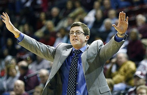 In this photo taken on Dec. 11, 2014, Louisiana Tech women's basketball coach Tyler Summitt signals to his players during an NCAA college basketball game against Mississippi State in Starkville, Miss.