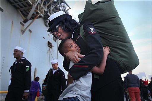 Shanita Frieson and son Anthony Black, 7, are reunited Wednesday, Dec. 24, 2014, in San Diego, Calif.