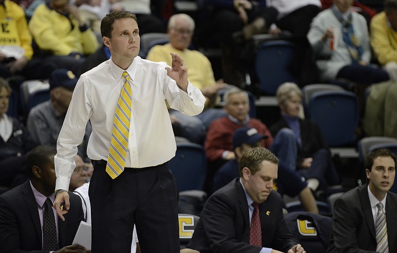 UTC's head coach Will Wade watches his players from the sidelines during their 93-81 UTC victory against Northern Kentucky at McKenzie in Chattanooga in this Dec. 16, 2014, photo.