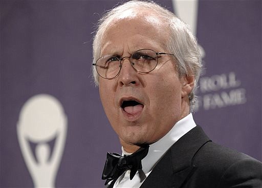 Chevy Chase has fun at the Rock and Roll Hall of Fame Induction Ceremony, in New York, in this 2008 file photo.