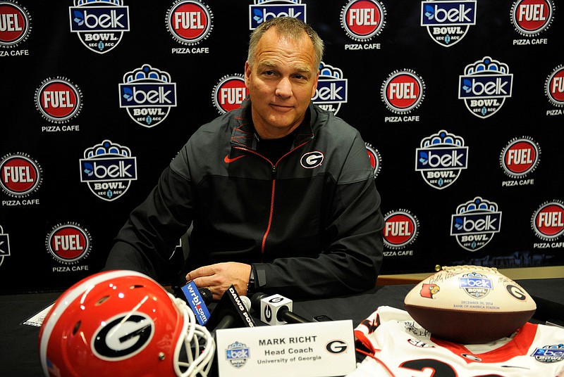 Georgia coach Mark Richt answers questions during the Belk Bowl news conference Monday at AT&T Ball Park in Charlotte, N.C.
