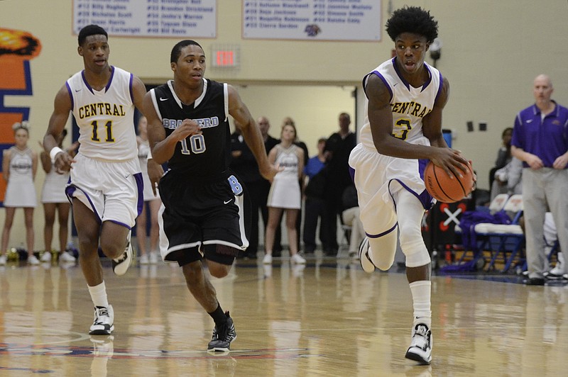 Central's Tre Tiller brings the ball up the court Monday during his team's 71-55 win against Brainerd at the Times Free Press Best of Preps basketball tournament at Chattanooga State Community College.