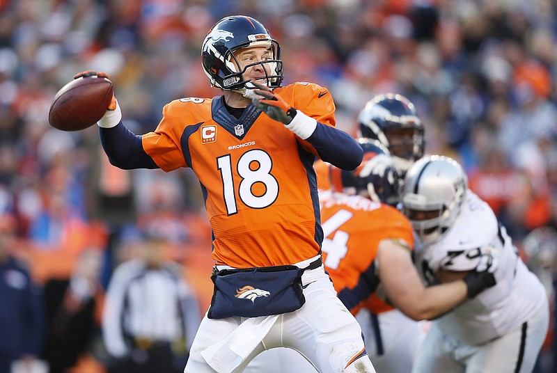 Manning's TD passes tops NFL records