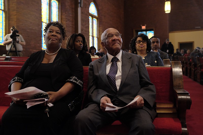 Outgoing president James Mapp, right, and incoming president Dr. Elenora Woods sit together during the Chattanooga-Hamilton County NAACP's Jubilee Day Celebration on Thursday at First Baptist Church of Chattanooga. The celebration, which was themed "All lives matter," ended with the swearing-in of the organization's new officers.