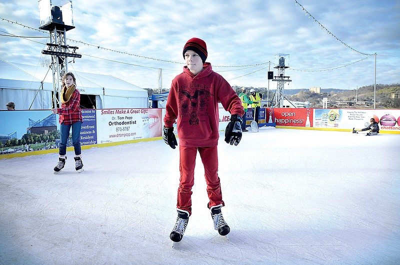 Mace Murphy skates on the ice rink set up at Ross's Landing.