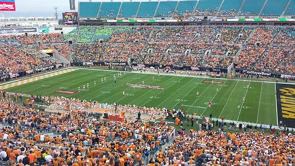 Tennessee kicks to Iowa to open the Taxslayer Bowl in Jacksonville, Fla. (Photo by Patrick Brown)