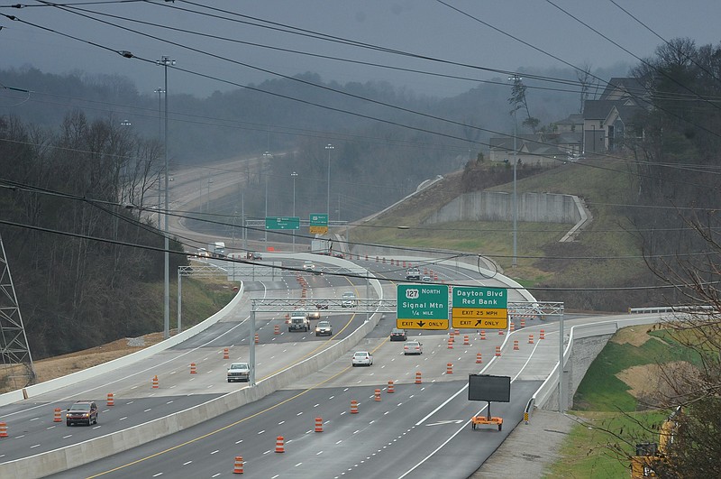 In this view looking north from Stringer's Ridge, reconstruction of U.S. Highway 27 north of the Olgiati Bridge is nearing completion. It was a three-year lane widening project.