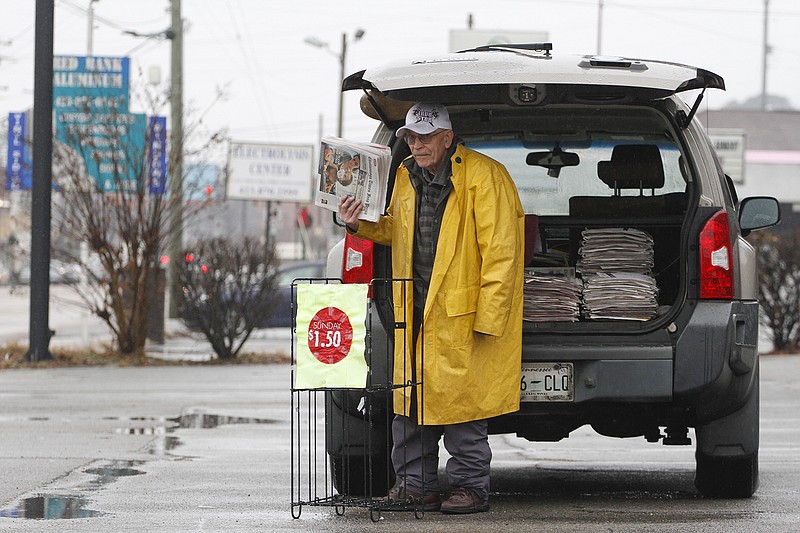Buford Cabrera, 80, sells Sunday papers at the corner of Ashland Terrace and Dayton Boulevard in Red Bank. Cabrera has only missed four days in the past 15 years of selling papers at his corner. 