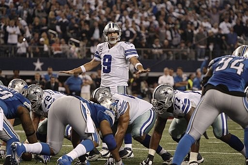 Dallas Cowboys quarterback Tony Romo (9) calls a play during his NFL wildcard playoff game against the Detroit Lions on Jan. 4, 2015, in Arlington, Texas.