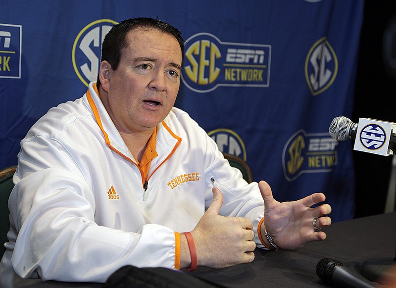 Tennessee head coach Donnie Tyndall answers a question during a news conference at the Southeastern Conference NCAA men's college basketball media day in Charlotte, N.C., on Wednesday, Oct. 22, 2014.