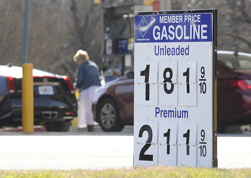 Susy Talley, of Dalton, Ga., fills her tank Monday at the Sam's Club fuel island on Lee Highway where regular unleaded is $181.9 for members. "I'm loving it," Talley said. "I just came from Georgia where the lowest I saw was $2.02-a-gallon."