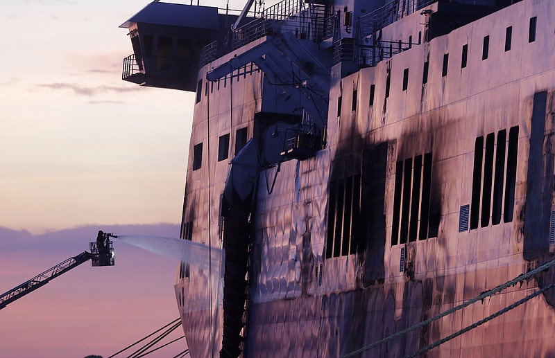 Fierce heat on charred Greek ferry slows search for bodies ...