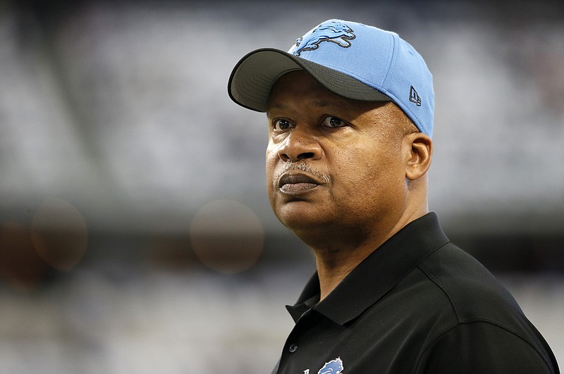 
              Detroit Lions head coach Jim Caldwell watches his team before an NFL wildcard playoff football game against the Dallas Cowboys, Sunday, Jan. 4, 2015, in Arlington, Texas. (AP Photo/Tony Gutierrez)
            