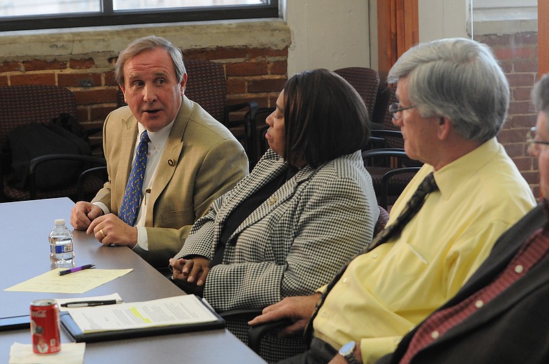Rep. Mike Carter, far left, talks about Erlanger making money alongside JoAnne Favors and Todd Gardenhire during the Times Free Press sponsored Legislative Roundtable Tuesday at the newspaper. (Staff Photo by Tim Barber)