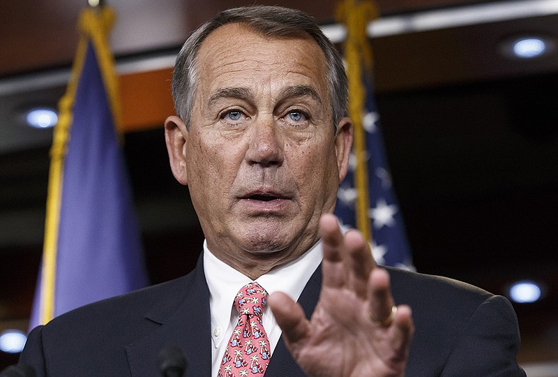 In this Dec. 11, 2014, file photo, House Speaker John Boehner of Ohio speaks during a news conference on Capitol Hill in Washington. 