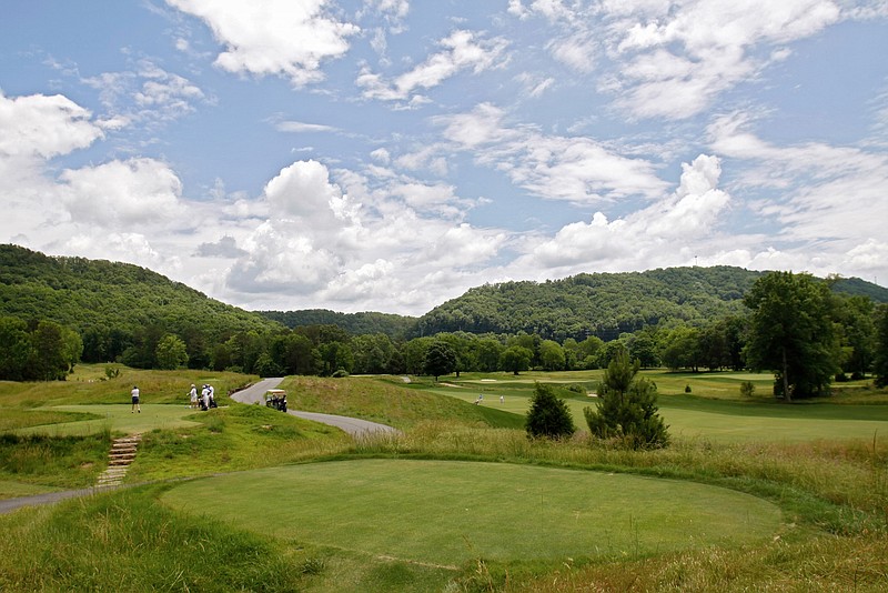Golfers tee off on hole 8 at the Honors Course in Ooltewah, Tenn., in this file photo.
