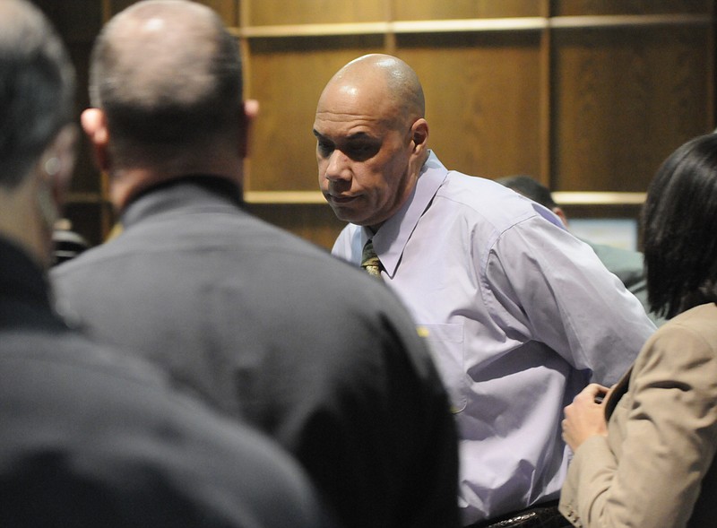 Judge Rebecca Stern orders Hamilton County Deputy's, left, to escort Adolphus Hollingsworth from the courtroom  following Friday's jury decision of guilt in the death of his wife in 1997. Hollingsworth was convicted of the second-degree murder and will be sentenced in March.