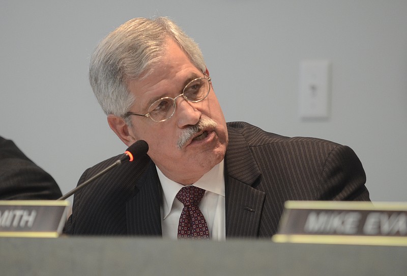 Superintendent Rick Smith asks a question during a school board meeting in this Oct. 28, 2014, photo.