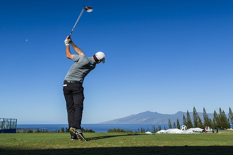 
              Zach Johnson hits off the first tee during the second round of the Tournament of Champions golf tournament, Saturday, Jan. 10, 2015, in Kapalua, Hawaii.  (AP Photo/Marco Garcia)
            