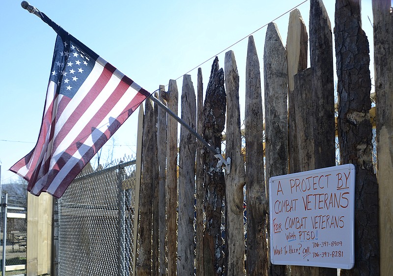 A flag hangs outside of Fort Villanow. When complete, the Old West-themed town will offer combat veterans a place to benefit from the company of other vets and learn new skills.