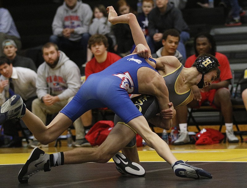 Hixson's Jacob Newman, right, wrestles Red Bank's William Reichel Tuesday at Hixson High School.