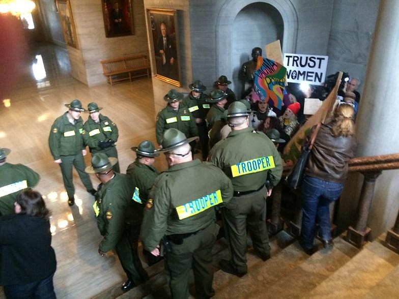 State troopers arrive at Tennessee Capitol as protesters continue loud shouting. Photo by Rick Locker.