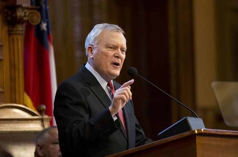 
              Georgia Gov. Nathan Deal gestures while delivering his State of the State Address at the Capitol, Wednesday, Jan. 14, 2015, in Atlanta. (AP Photo/David Goldman)
            