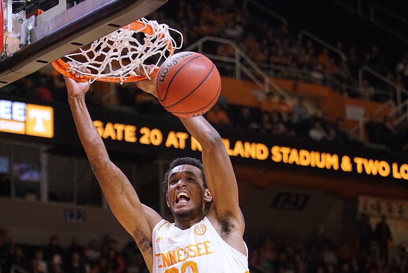 Tennessee's Derek Reese dunks against Arkansas in the first half of an NCAA college basketball game Tuesday, Jan. 13, 2015, in Knoxville.