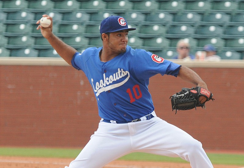 Lookouts pitcher Yimi Garcia (10) delivers a pitch in the first game of a double header aginst the Jacksonville Suns in 2013. 
