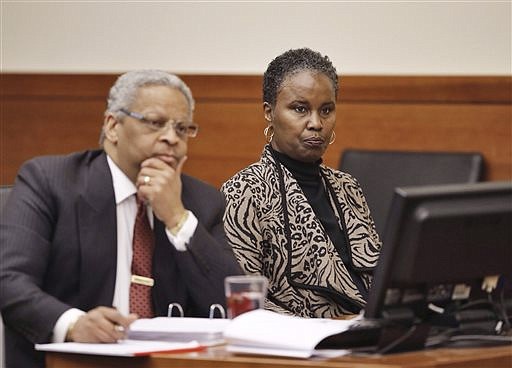 Sheila Kearns, right, listens to testimony in judge Schneider's Common Pleas Courtroom with attorney Geoffrey Oglesby on =Jan. 13, 2015. The former substitute teacher who showed a movie featuring graphic sex and violence to a high school class has been convicted of disseminating matter harmful to juveniles.