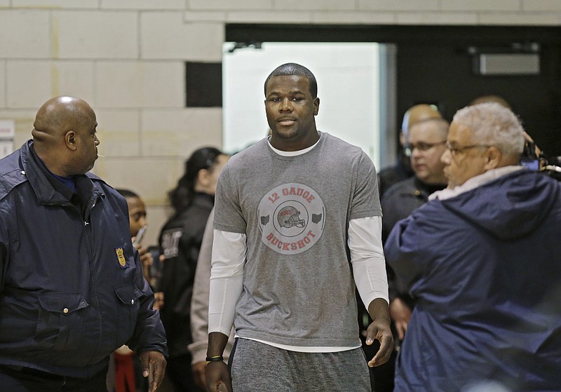 Ohio State quarterback Cardale Jones arrives at a news conference at Ginn Academy in Cleveland, Ohio, on Jan. 15, 2015. 
