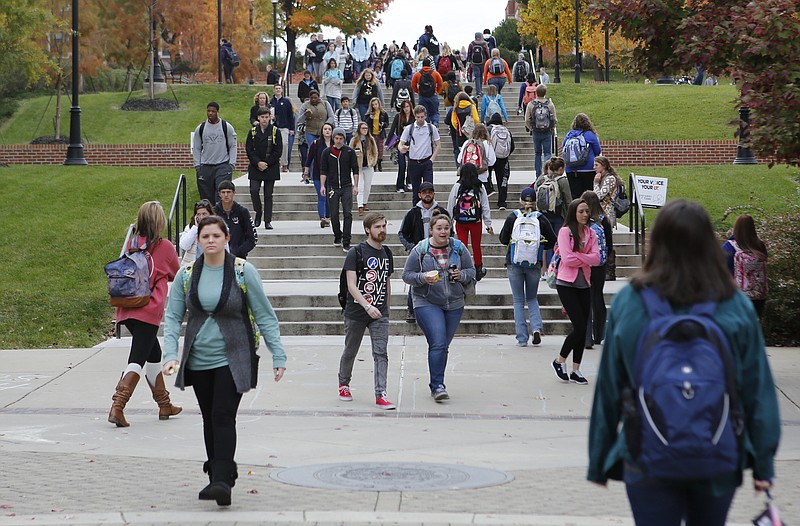 Students walk to class on the campus of the University of Tennessee at Chattanooga in this Nov. 12, 2014, photo.