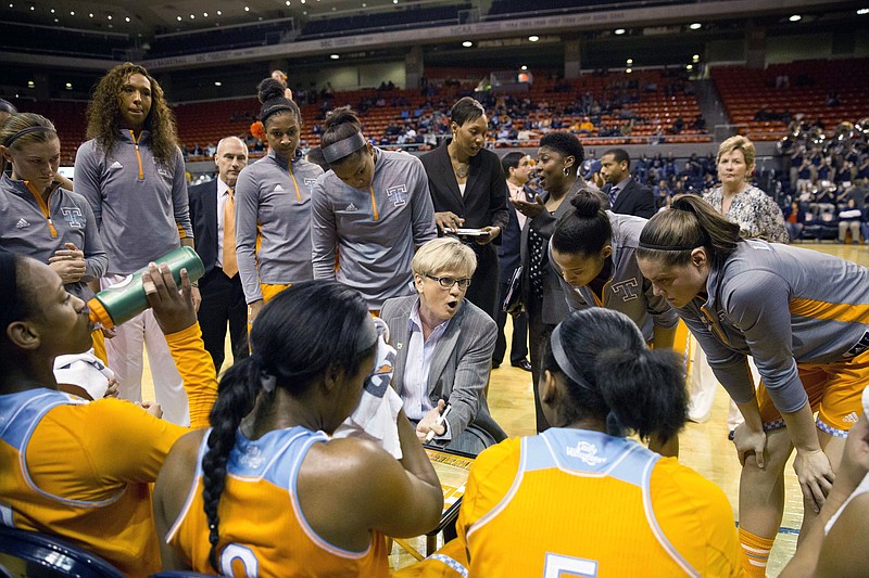Tennessee head coach Holly Warlick speaks with her team during a timeout in their game on Jan. 15, 2015, in Auburn, Ala. Tennessee won 54-42.