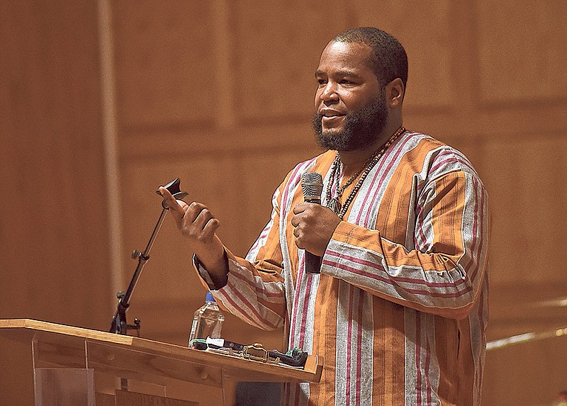 Umar Abdullah-Johnson speaks during the annual Dr. Martin Luther King program at Olivet Baptist Church on Monday.