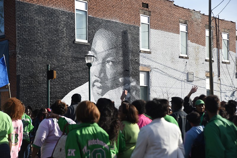 People march in the annual parade down Martin Luther King Jr. Boulevard  to honor Dr. Martin Luther King in this 2015 photo.