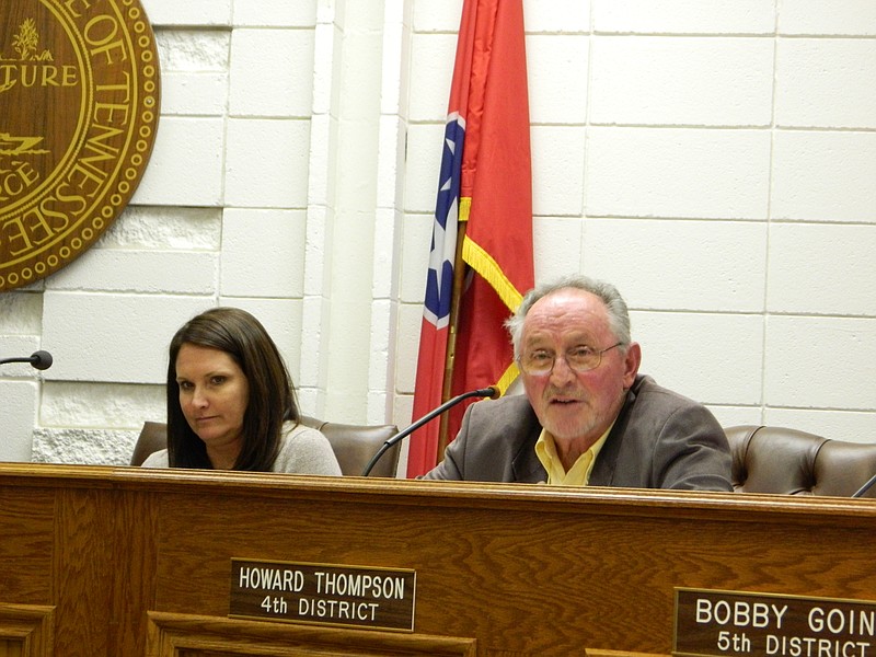Bradley County Commissioner Charlotte Peak, left, listens as Commissioner Howard Thompson expresses opposition to a proposed adoption of new building codes by the county. His opposition was based on negative feedback received from his constituents, not his own feelings, he said.