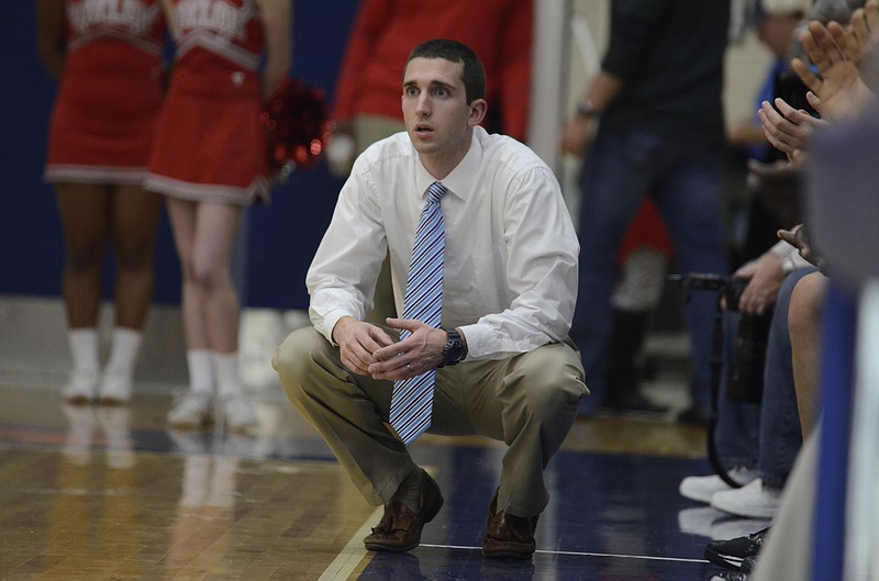 Hamilton Heights head coach Zach Ferrell watches his players from the sidelines during Hamilton Heights championship win against Baylor at the Times Free Press Best of Preps basketball tournament at Chattanooga State Community College in Chattanooga, Tenn., on Monday, December 29, 2014.