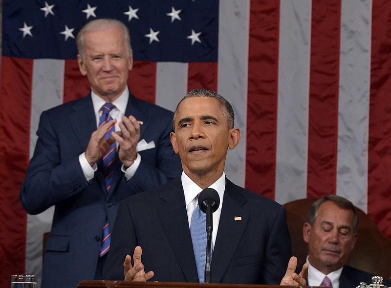 President Barack Obama delivers his State of the Union address to a joint session of Congress on Capitol Hill on Tuesday, Jan. 20, 2015, in Washington, as Vice President Joe Biden applauds and House Speaker John Boehner of Ohio, listens.