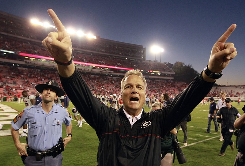 Georgia head coach Mark Richt celebrates after defeating Mississippi 37-10 on Nov. 3, 2012.